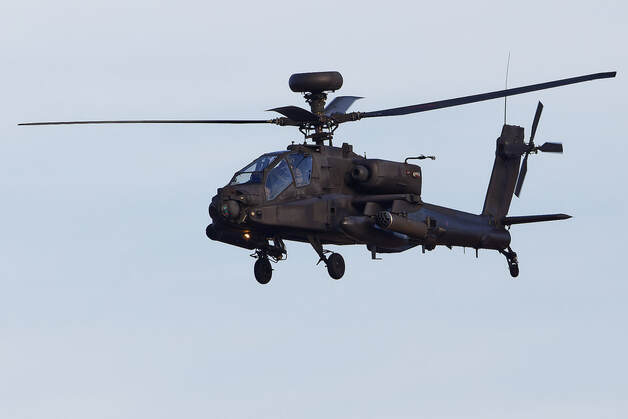 AH-64 Apache attack helicopter in flight